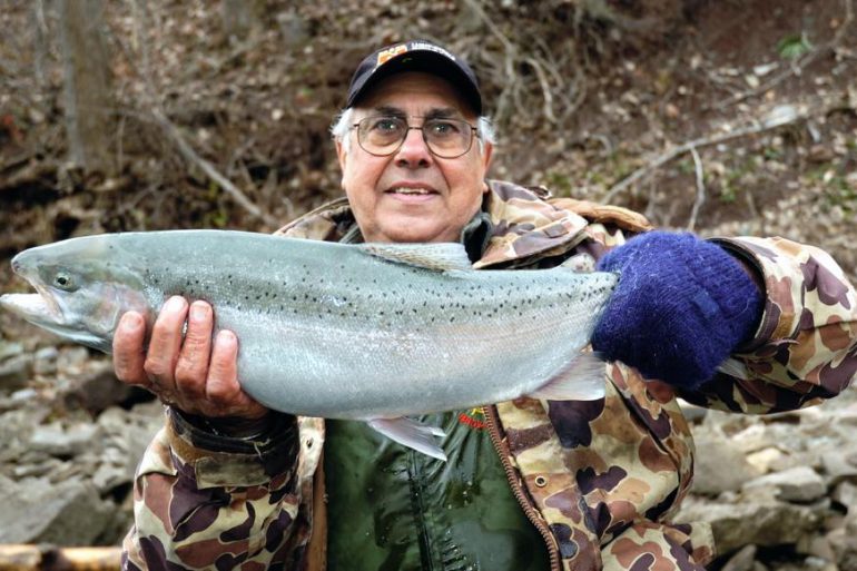 Tony Valeriote with a gorgeous rainbow trout he caught in the Niagara River using one of his hand-made Slinky sinkers.