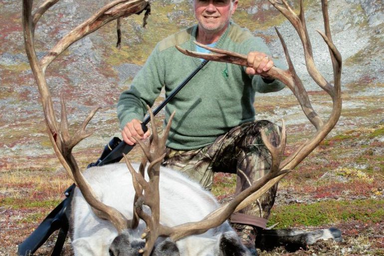 Credit: Russell Forbes. Russell Forbes and his rescinded record.