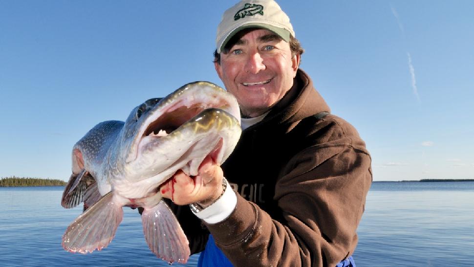 Credit: Gord Pyzer. The author and a trophy fall pike.