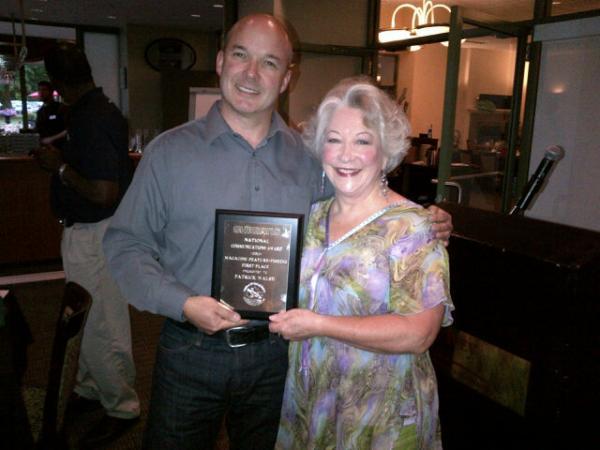 Plaque presentation: Yours truly receives his OWC award from the organization's awards chair, Adrienne Radford