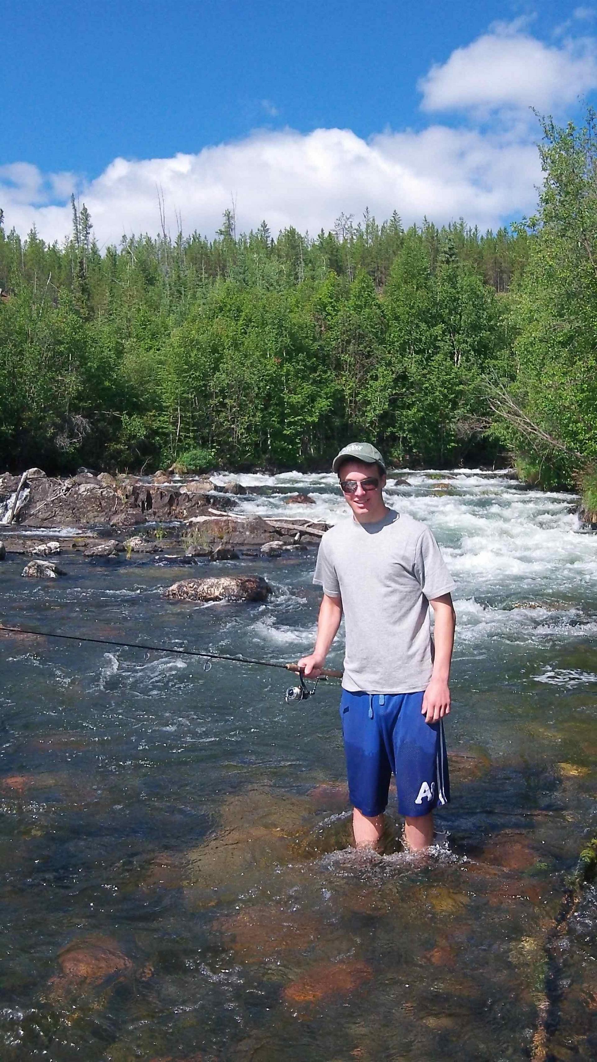 Wet wading: Riley Walsh fishing for Arctic grayling on the N.W.T.'s McCrea River