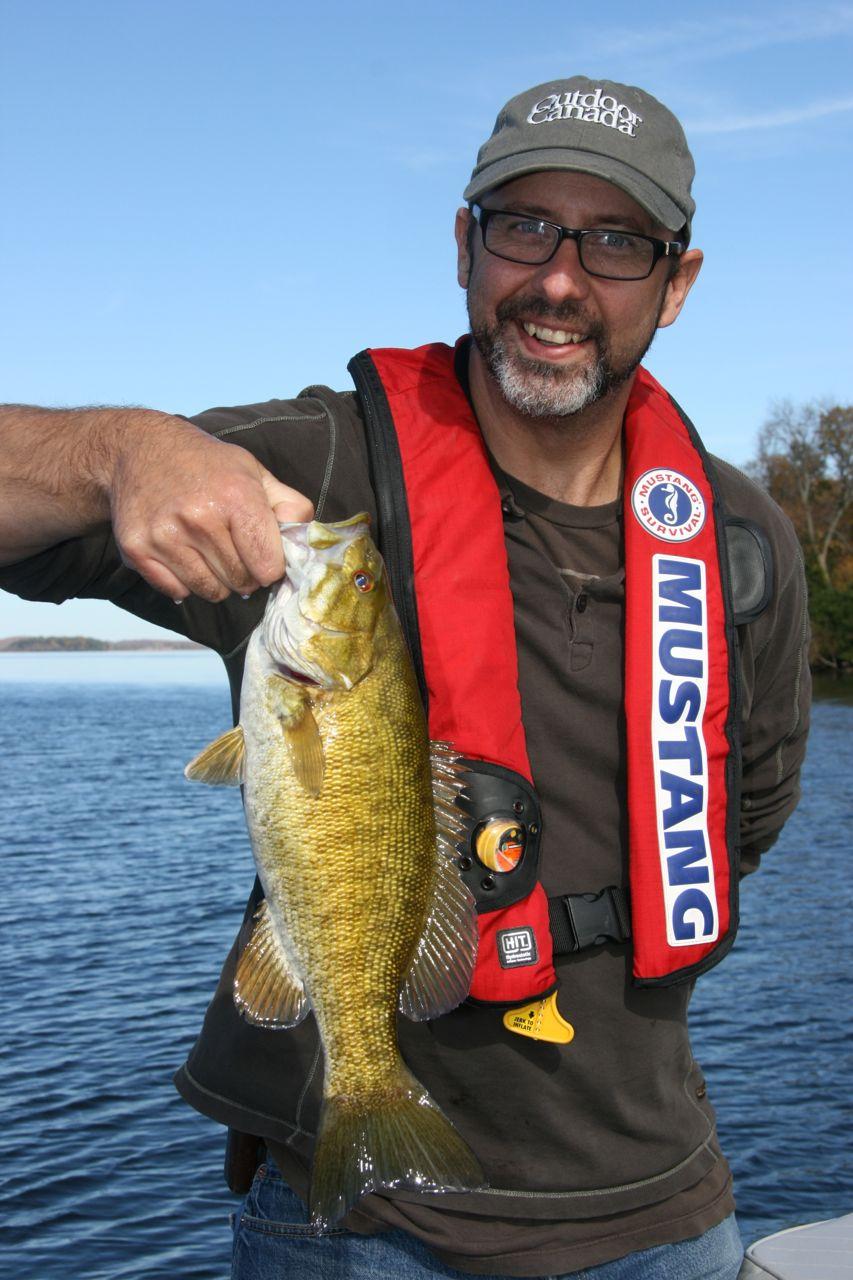 Bass happy: Outdoor Canada managing editor Bob Sexton and one of his catches