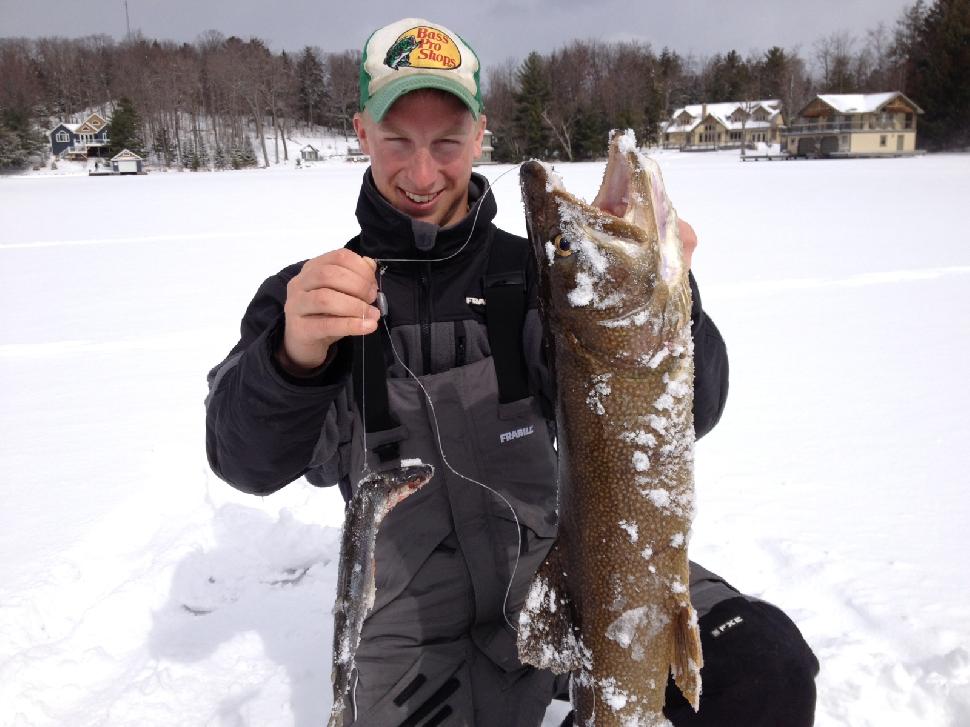 Amazingly, Leavon is catching lake trout on dead baits set for pike in water as shallow as three feet deepTo prove the point, Leavon included a super cool image of his buddy, Steve Rowbowtham holding a pike he caught last year with a lake trout stuck in its throat.