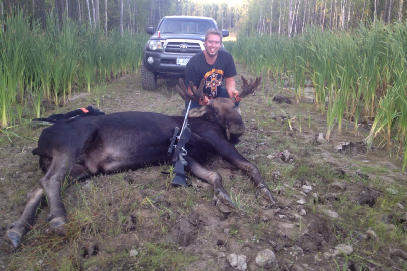 Josh Jensen with a moose