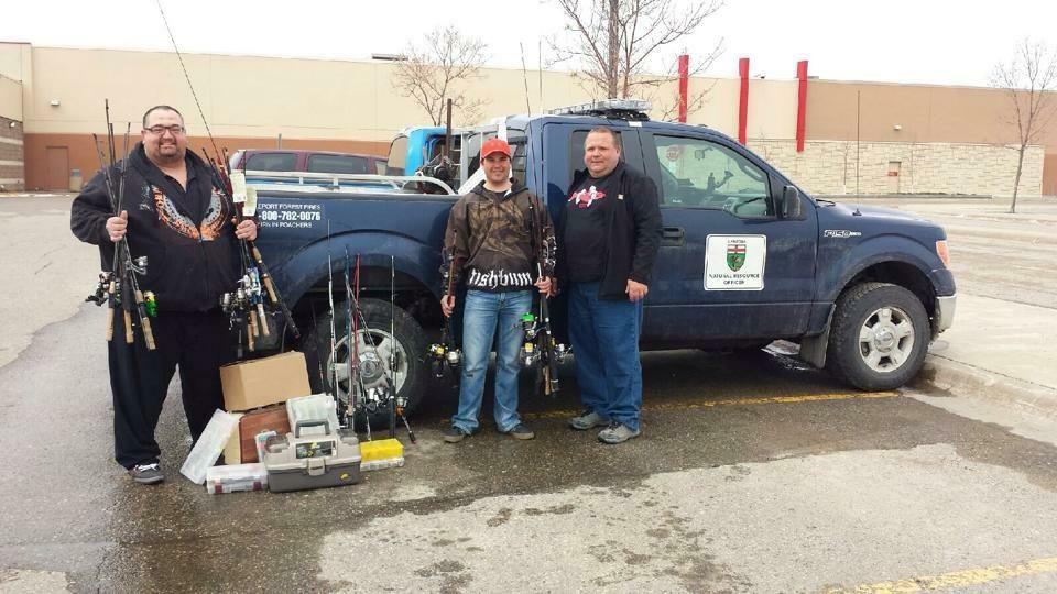 Dan Goulet (left) and Craig Ferris (right) are shown here delivering the fishing tackle donated by WAAM members to Elliott Hrychuk (centre)