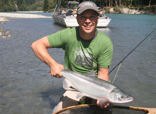 Credit: Tony Nootebos. Ted Cawkwell and a sockeye.