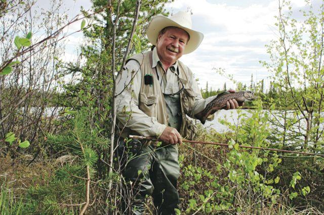 Credit: Neil Waugh. The author with a tiger trout from Burtlein Lake in Saskatchewan’s Narrow Hills.