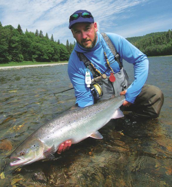 Credit: Nick Pujic. Serge Collin with his 25-pound Atlantic.