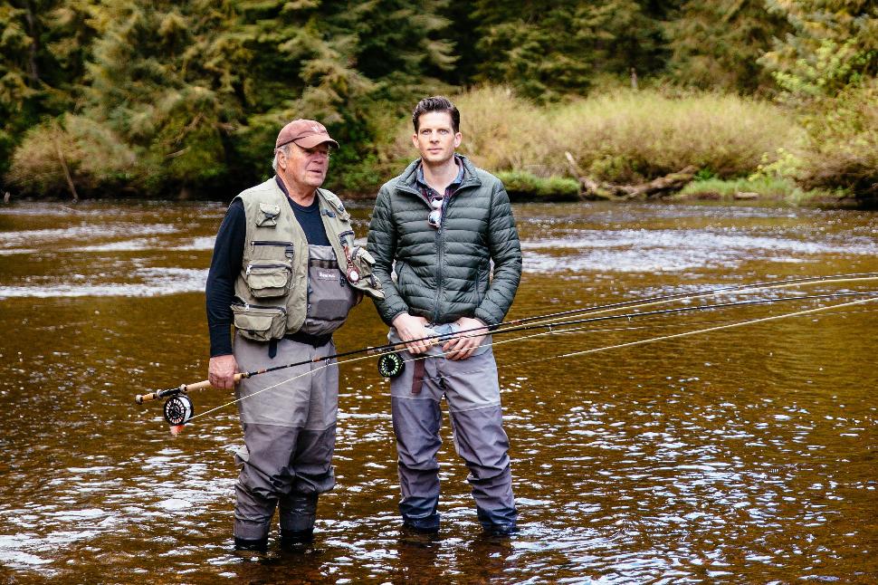 Nimmo Bay Resort founder Craig Murray (left) and singing son Clifton wet a line together. Credit: Jeremy Koreski.