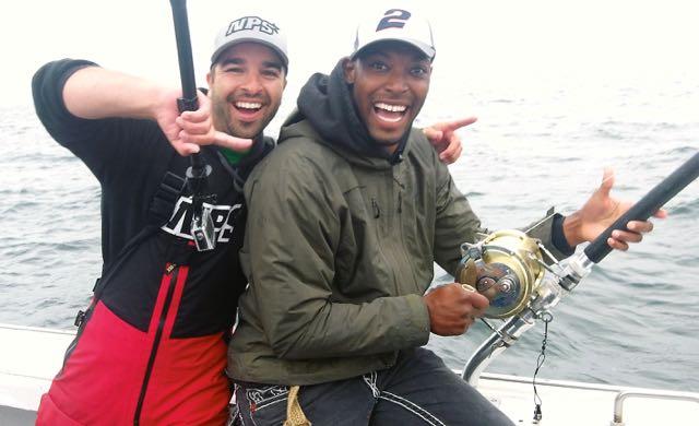 Dan Miguel and Gerald Sensabaugh enjoy a fleeting moment of success before the team’s first fish slips the hook. Credit: Patrick Walsh.