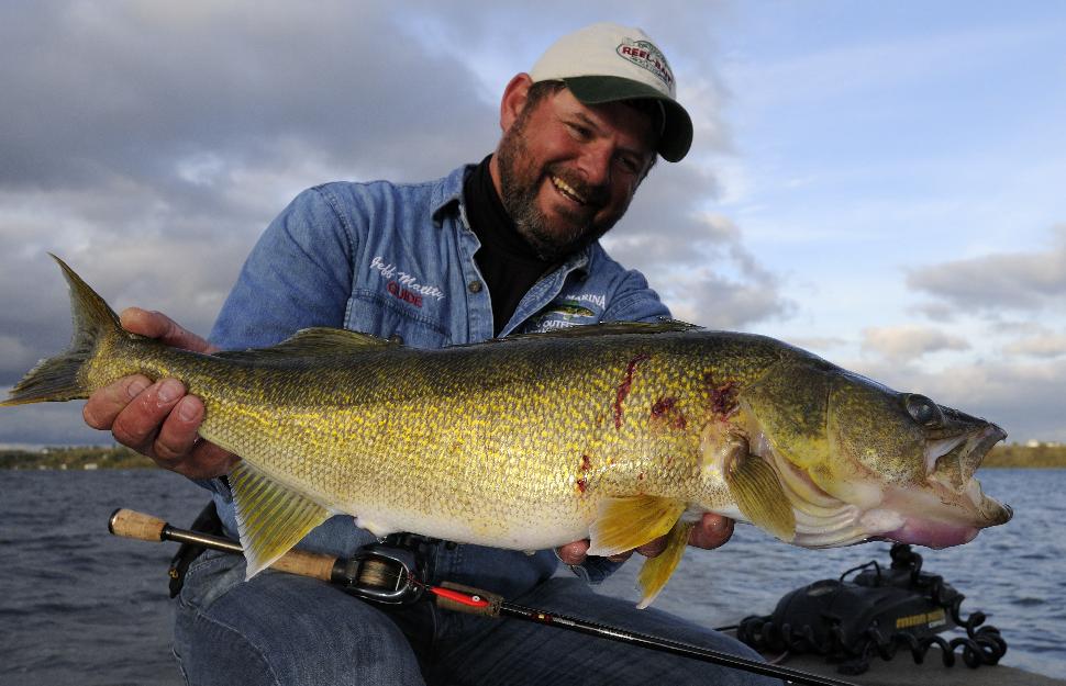 While most anglers wash their hands and lures to remove the odour of a northern pike, thinking it scares away other fish, Jeff Matity tips his lures with a thin strip of pike belly