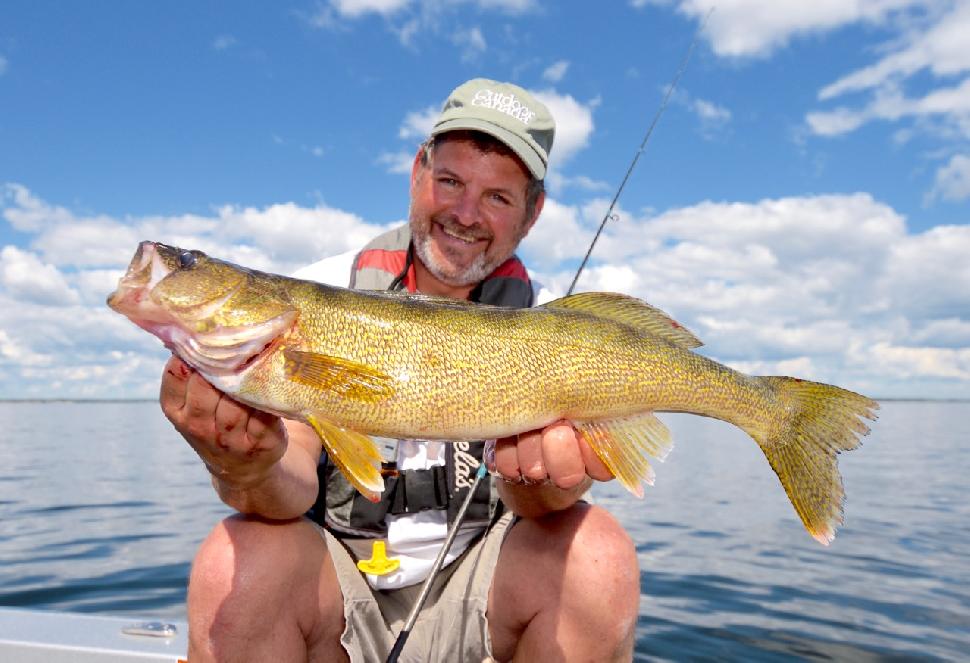 Target large, barren flats to catch walleye on jigging minnows. Credit: Gord Pyzer.