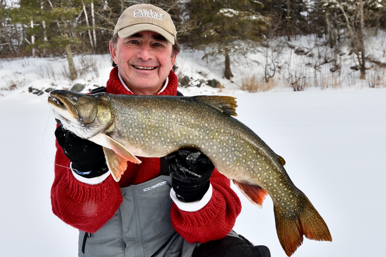 Ice Fishing Trout Mid Winter on Deep Water Structure 