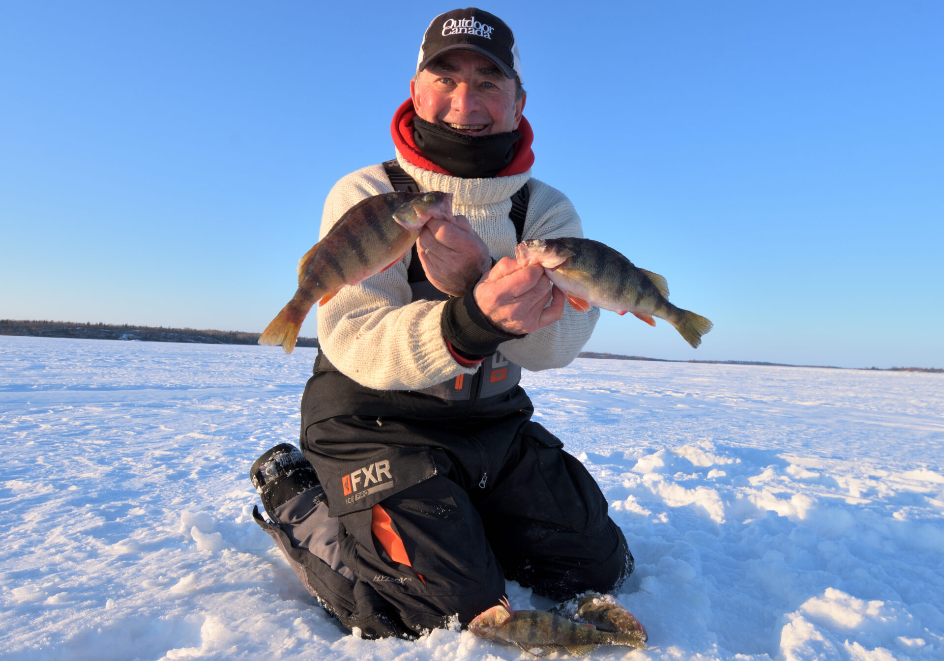 How to Ice Fish for Giant Walleye, Lake Trout, and Perch